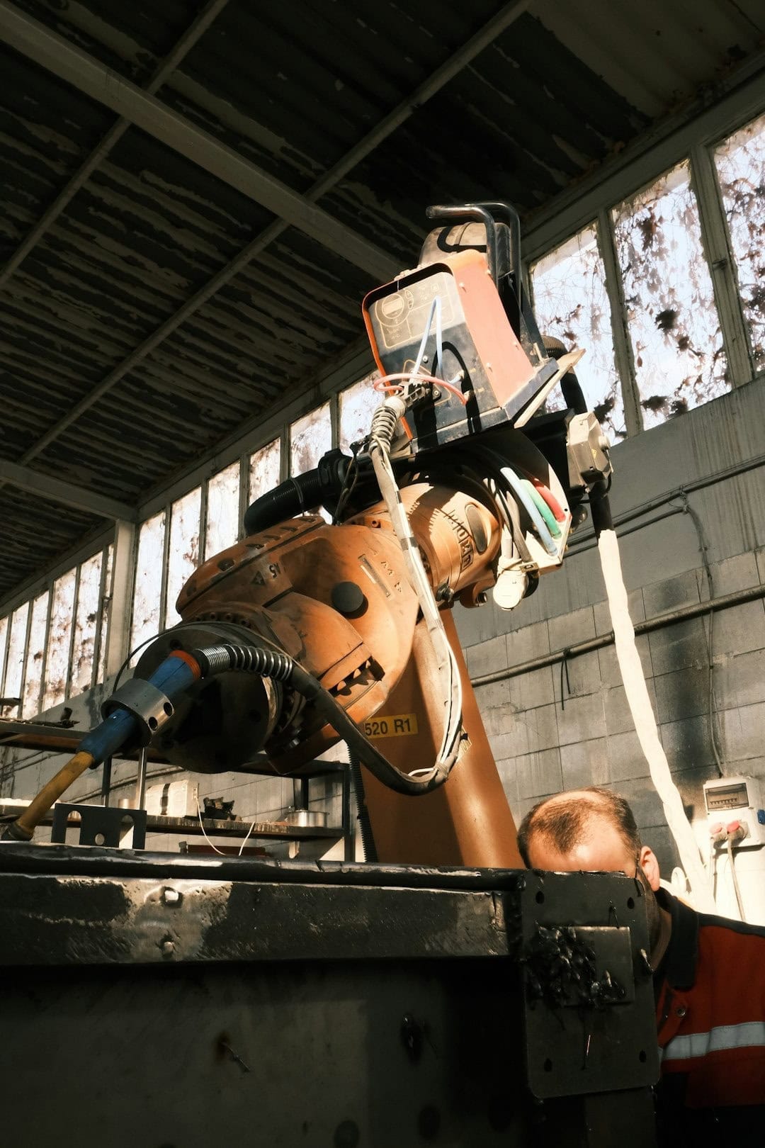 robot industrial automatizacion trabajo ia inteligencia artificial fabrica 2026